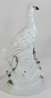 Lot 109 - A rare pair of 19th century Staffordshire pottery birds
