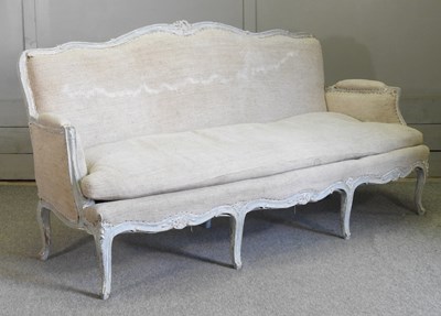 Lot 426 - A French carved and painted bergere sofa