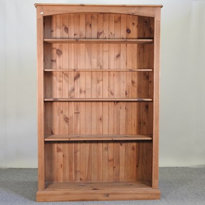 Lot 428 - A pine open bookcase