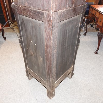 Lot 594 - A 19th century carved standing corner cabinet