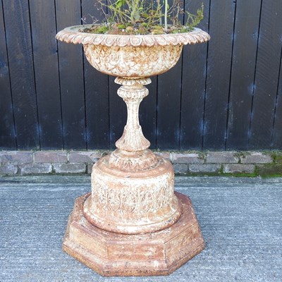 Lot 342 - A 19th century white painted cast iron garden urn