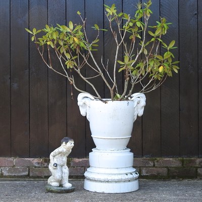 Lot 353 - A white ceramic garden pot on stand