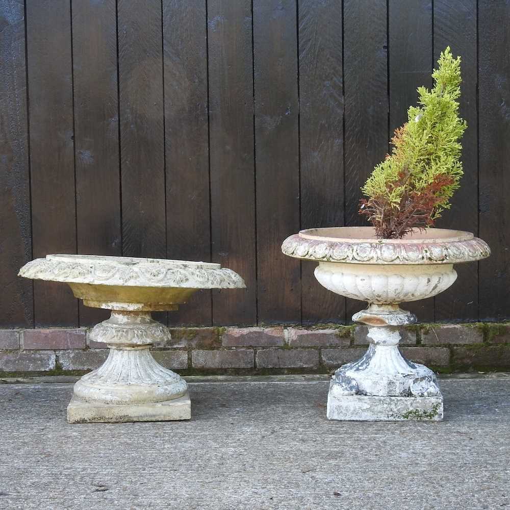 Lot 354 - An ornate garden urn on stand