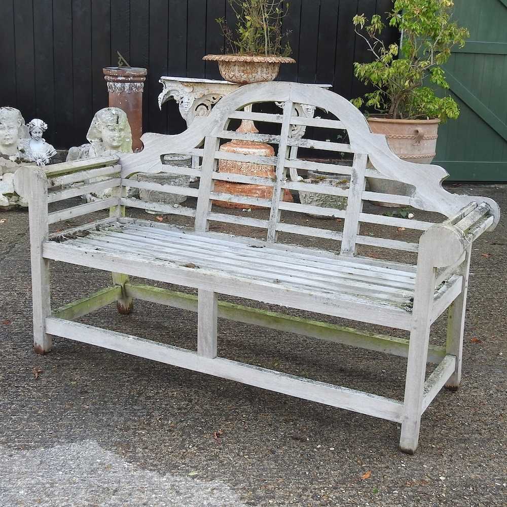 Lot 355 - A teak Lutyens style garden bench