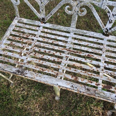 Lot 338 - A Regency style white painted cast iron garden bench