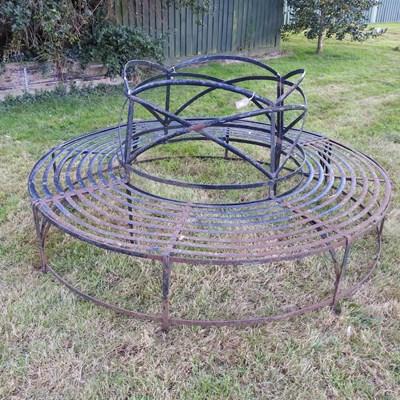 Lot 309 - A black painted iron circular tree bench