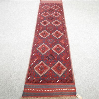 Lot 633 - A Turkish kelim runner