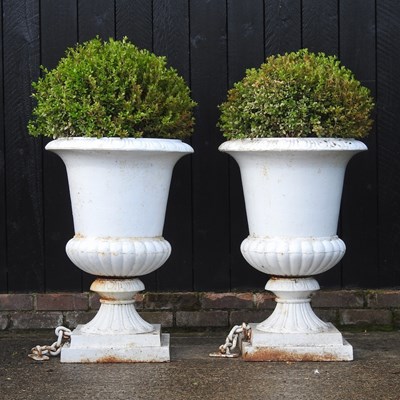 Lot 312 - A pair of large white painted iron garden urns