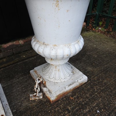 Lot 312 - A pair of large white painted iron garden urns