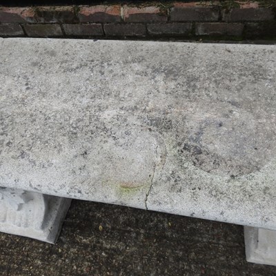 Lot 364 - A cast stone garden bench