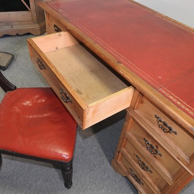Lot 430 - An antique pine pedestal desk