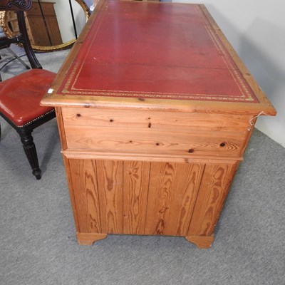 Lot 430 - An antique pine pedestal desk