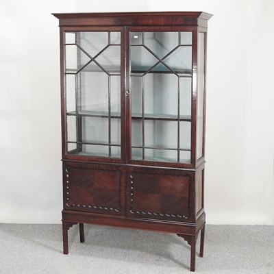 Lot 428 - An Edwardian glazed display cabinet