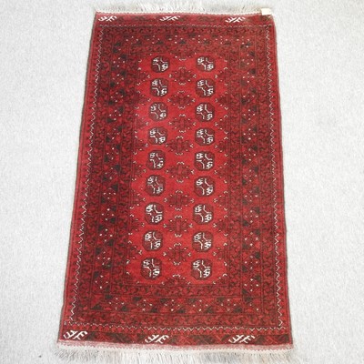 Lot 232 - A Turkish woollen rug