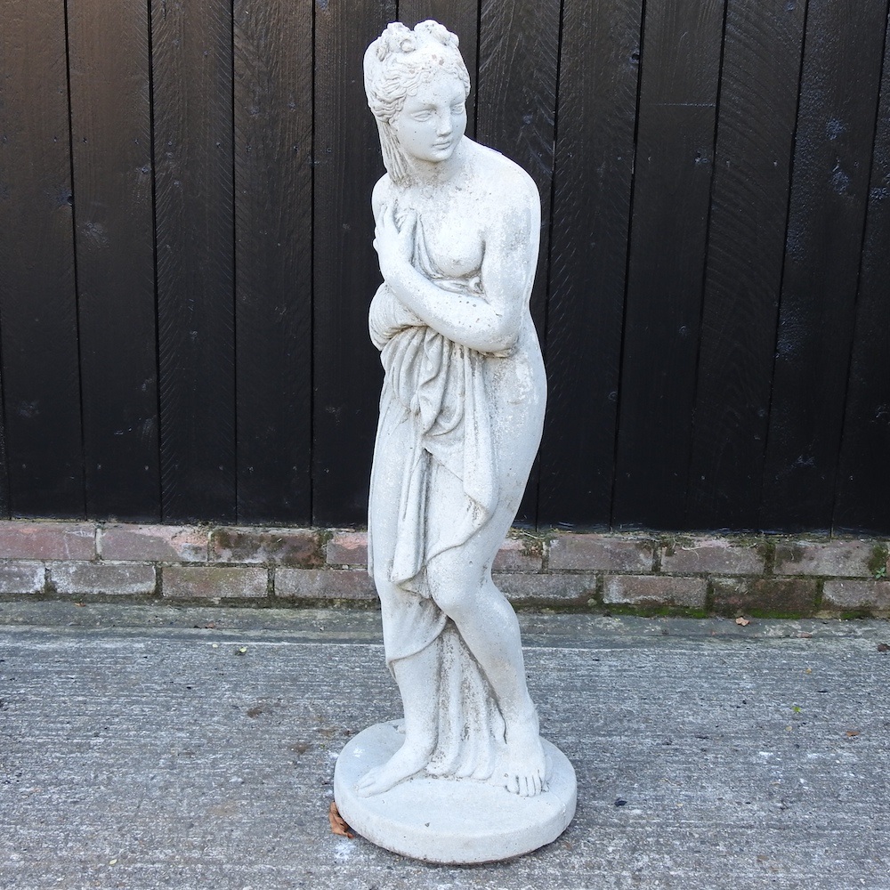 Lot 368 A cast stone garden statue of Miranda