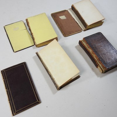 Lot 34 - A collection of four miniature books