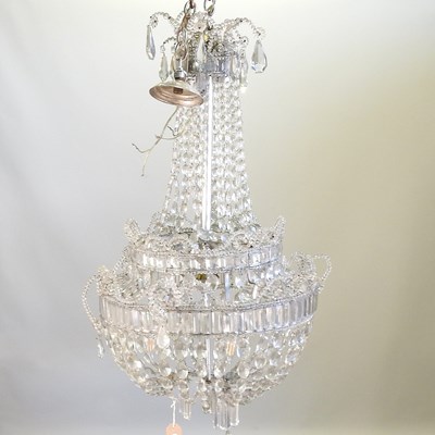 Lot 245 - A cut glass chandelier