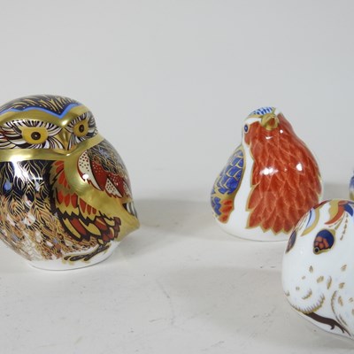 Lot 141 - A collection of eight Royal Crown Derby paperweights