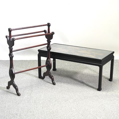 Lot 745 - An ebonised coffee table