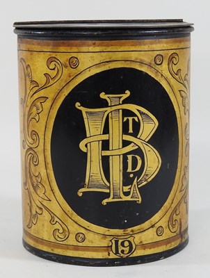 Lot 81 - A 19th century gilt decorated black tole canister