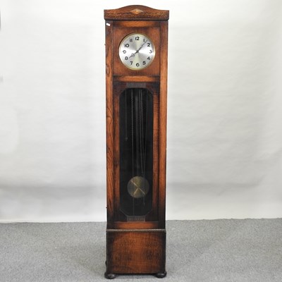 Lot 271 - A 1930's oak cased longcase clock