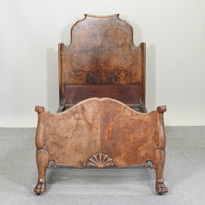 Lot 702 - A 1930's Queen Anne burr walnut single bedstead