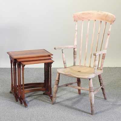 Lot 764 - A 19th century elm seated spindle back armchair