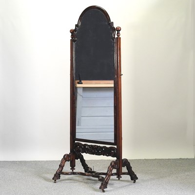 Lot 713 - A 1920's walnut cheval mirror