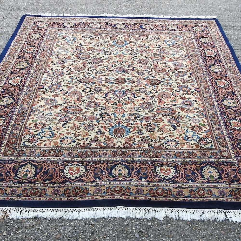 Lot 53 - A large Indian carpet, with all over floral design