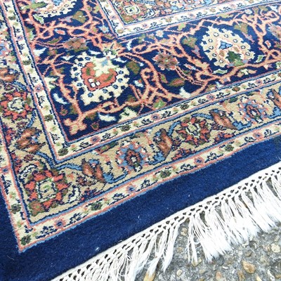 Lot 53 - A large Indian carpet, with all over floral design