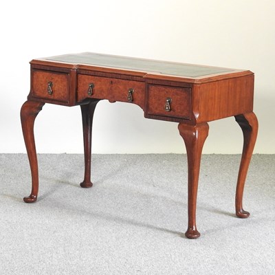 Lot 810 - A 1920's burr walnut desk