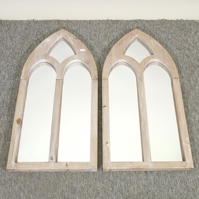 Lot 481 - A pair of pine arched wall mirrors