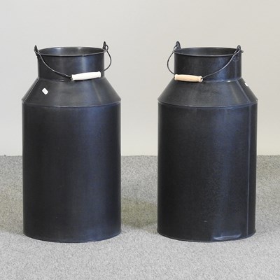 Lot 426 - A pair of black painted metal milk churns