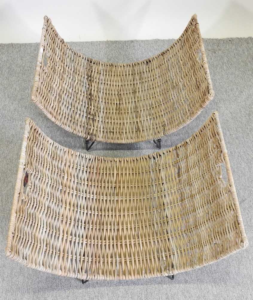 Lot 384 A pair of curved wicker log baskets