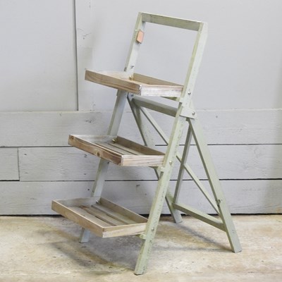 Lot 400 - A three tier wooden rack