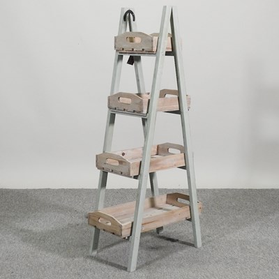 Lot 377 - A four tier wooden rack