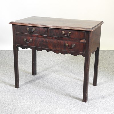 Lot 460 - An 18th century mahogany lowboy