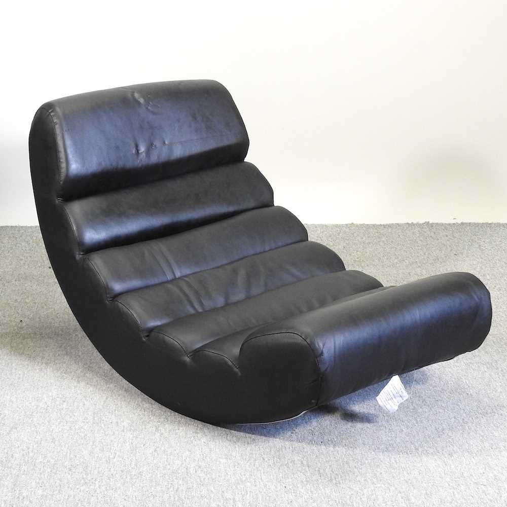 Lot 827 - A modern black upholstered chair