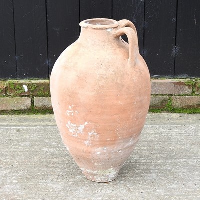 Lot 466 - A terracotta olive jar