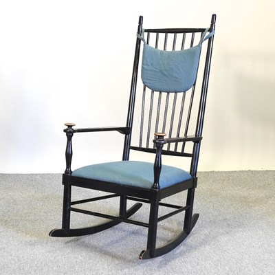 Lot 685 - A vintage Swedish ebonised rocking chair