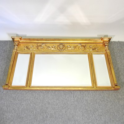 Lot 687 - A gilt painted over mantel mirror