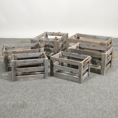 Lot 335 - Two sets of three grey apple crates