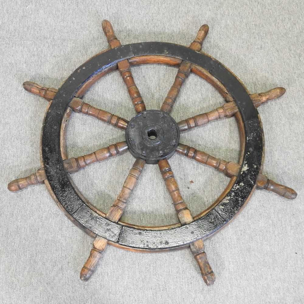 Lot 443 - A vintage wooden ship's wheel