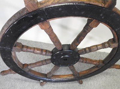 Lot 443 - A vintage wooden ship's wheel