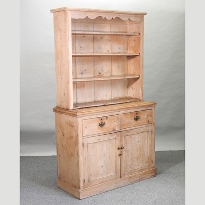 Lot 52 - An early 20th century stripped pine dresser