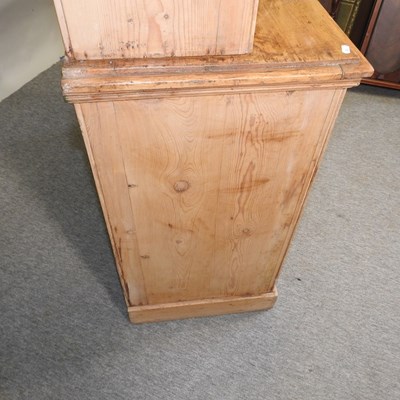 Lot 52 - An early 20th century stripped pine dresser