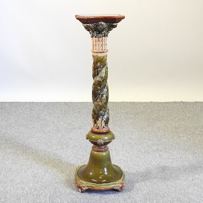 Lot 79 - An early 20th century green glazed jardiniere stand