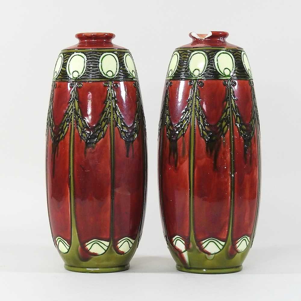 Lot 20 - A pair of early 20th century Minton vases