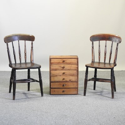 Lot 479 - A pair of elm seated spindle back chairs