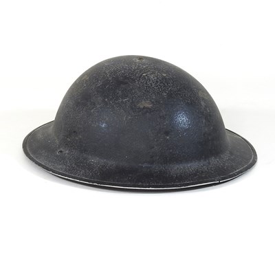 Lot 604 - A World War II era Brodie helmet